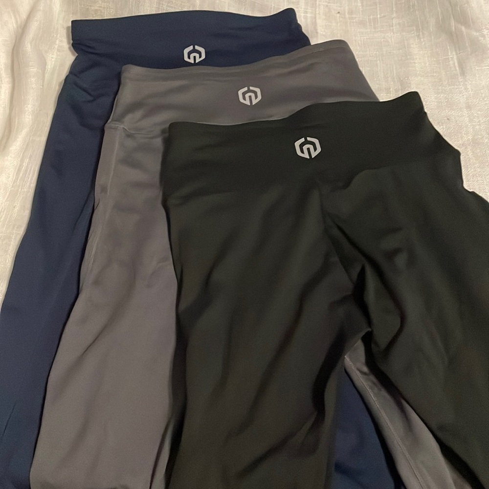 3 pair leggings with pockets- all Size L - black, blue, gray - new without tags.